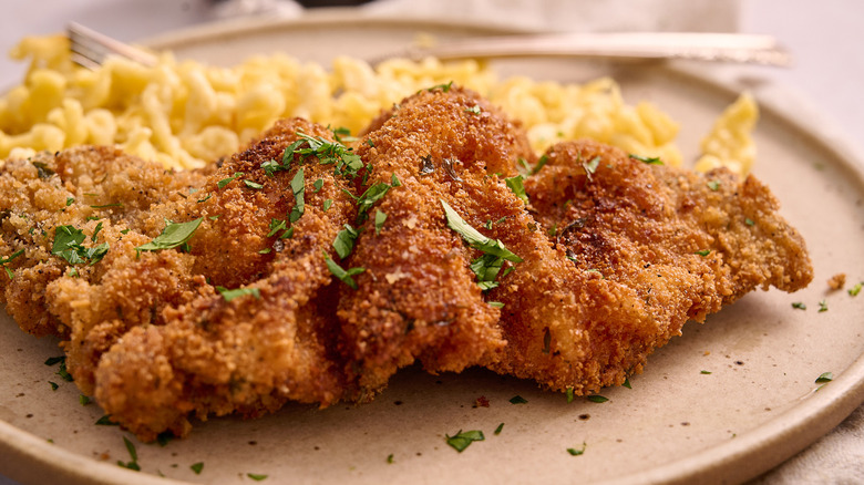 close up of wiener schnitzel on plate