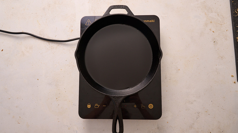 heating oil in skillet