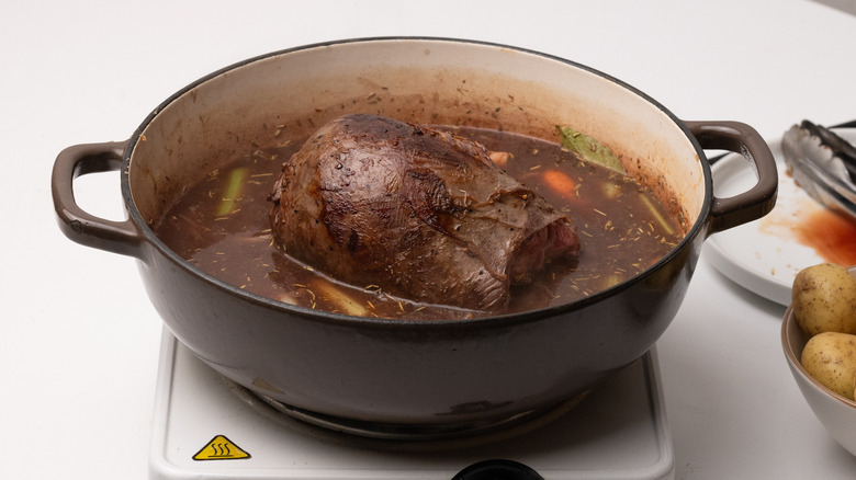 Broth and venison in pan