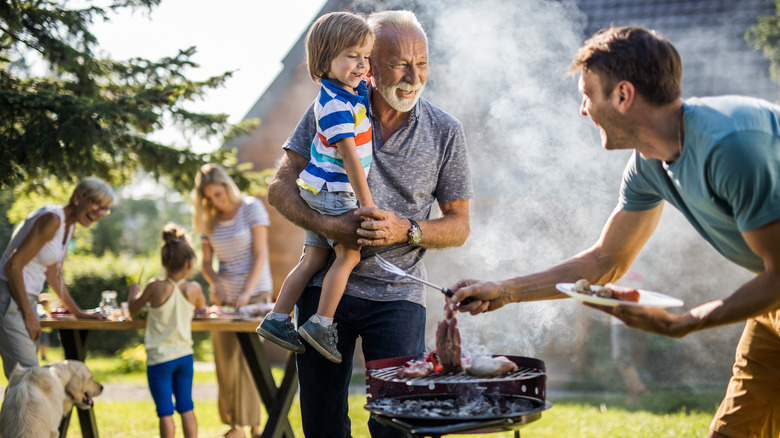 family barbeque with steak