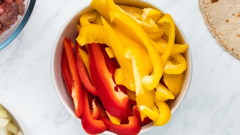 sliced bell peppers in bowl