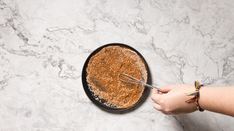 Whisking cinnamon and salt