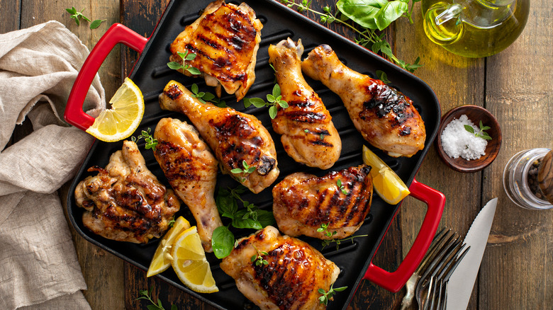 Grilled chicken drumsticks and thighs