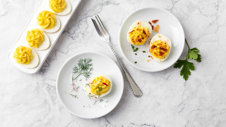 deviled eggs on a dinner plate