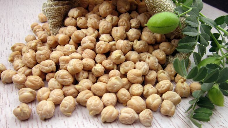 Chickpeas spilling out of sack