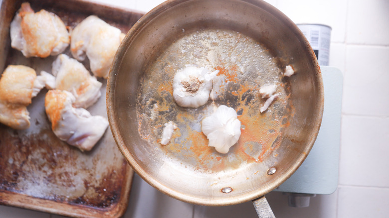 Garlic browning in pan