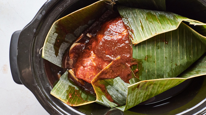 beef with adobo wrapped in banana leaves