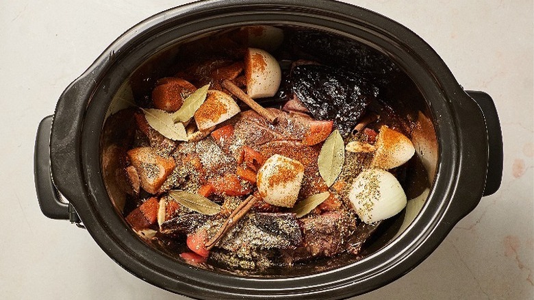 meat and vegetables in slow cooker