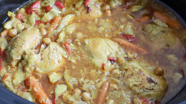 fully cooked chicken and artichoke tagine in a slow cooker