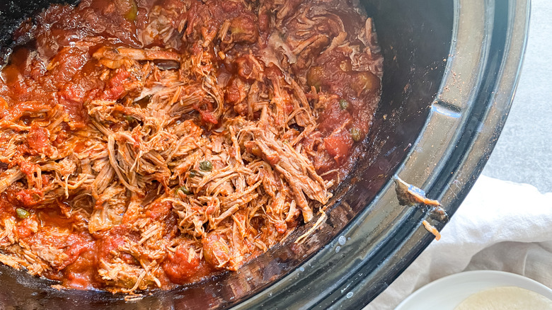 meat shredded in slow cooker