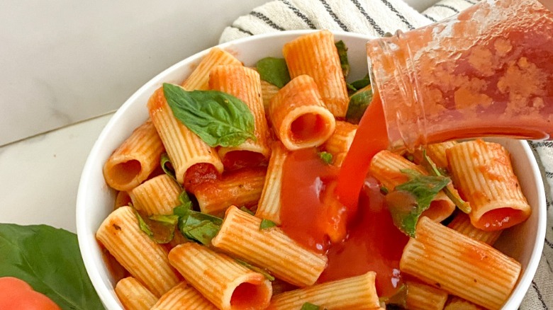 passata poured on pasta