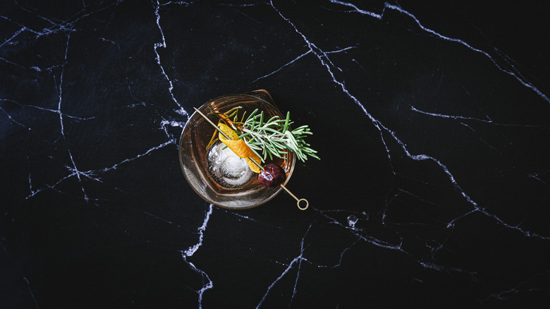 Cocktail with rosemary branch