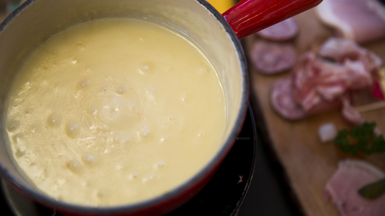 Close-up of cheese melting in pot