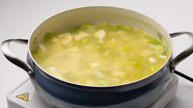 broth simmering in a pan