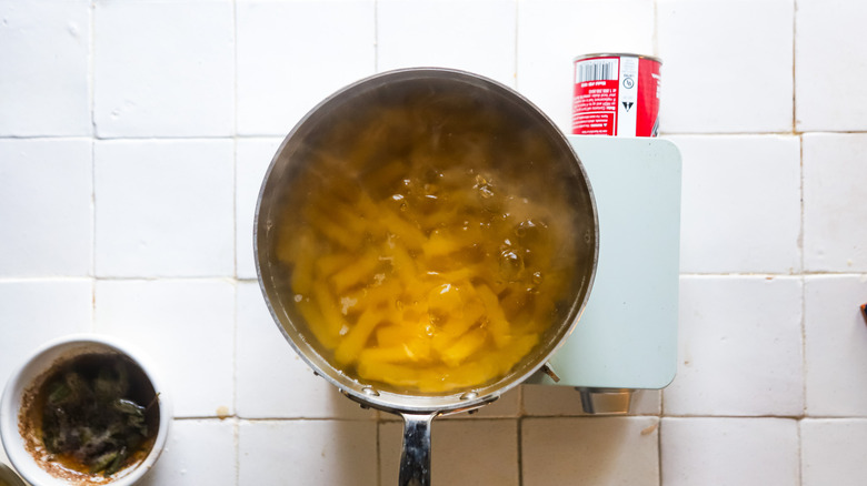 Pot boiling rigatoni pasta