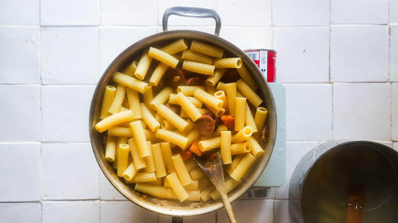 Cooked pasta in saute pan