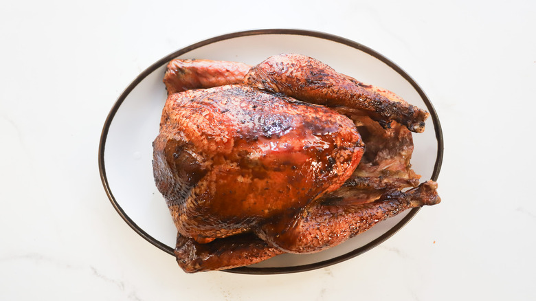 Smoked turkey on serving plate