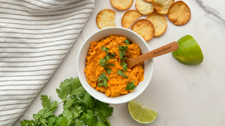 bowl of sweet potato dip with crackers