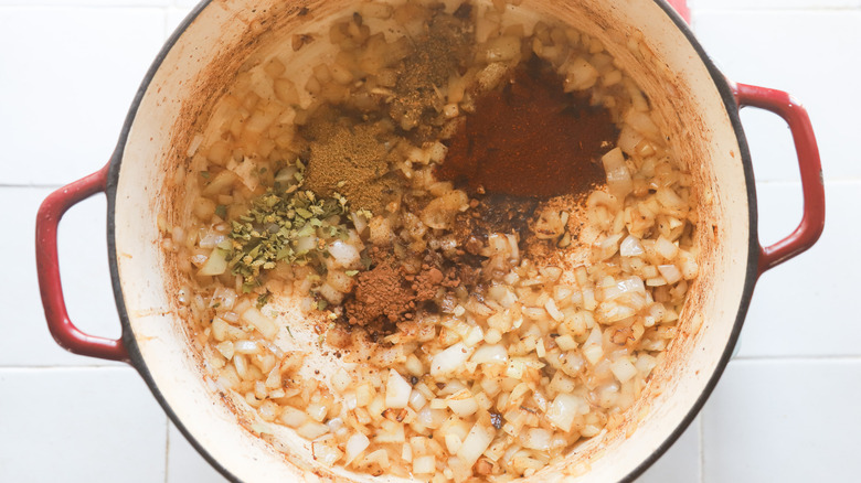 Dry spices toasting in pot