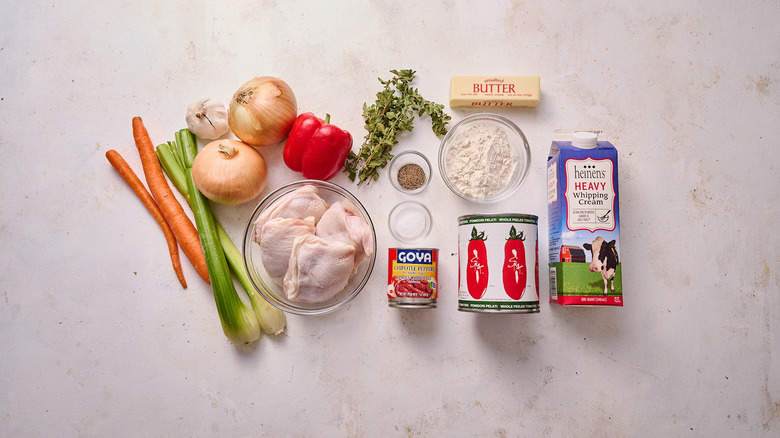 chicken and tomato soup ingredients on a table