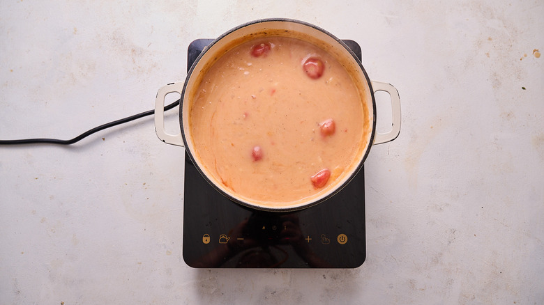 simmering soup in pot