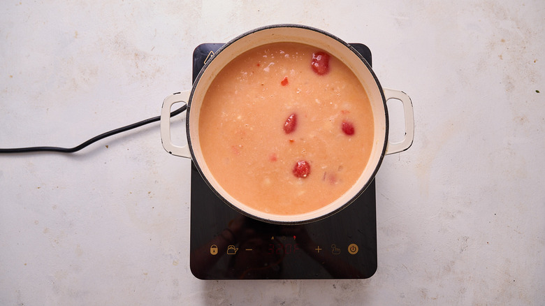 tomatoes in soup pot