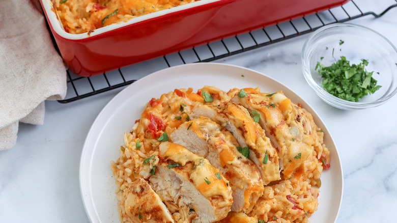 smothered queso chicken bake on a plate