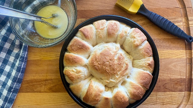 baked bread in pan with butter