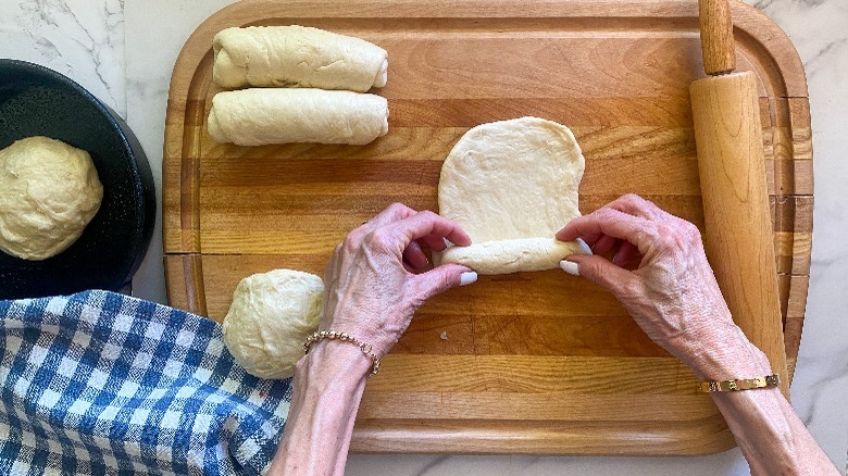 rolling up dough