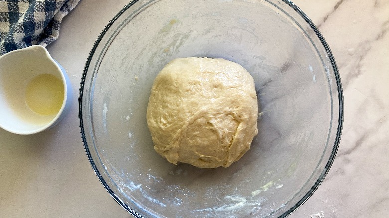 dough ball in glass bowl