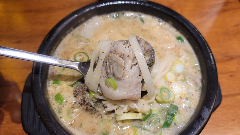 A bowl of soup made with soondae