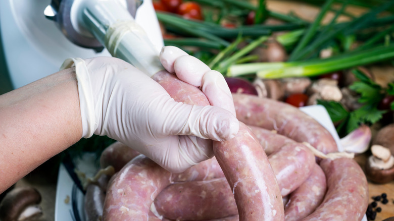 Sausage being made in a kitchen 