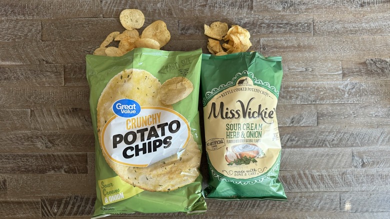 Two opened potato chip bags on a table