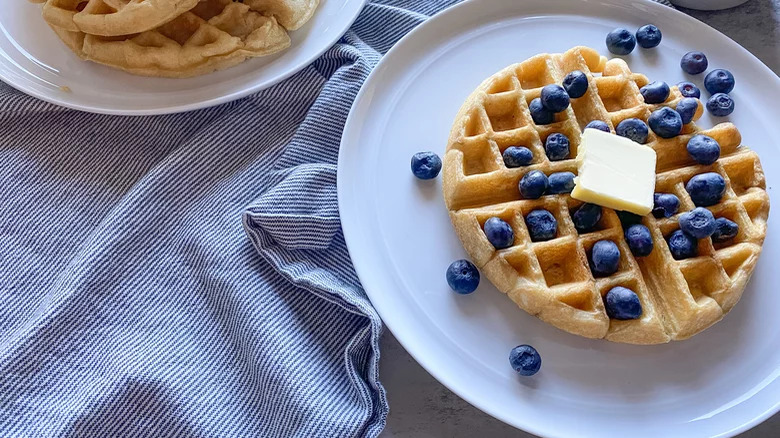 Belgian waffle with butter and blueberries