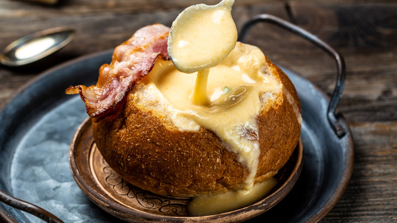 Bread bowl filled with beer cheese soup