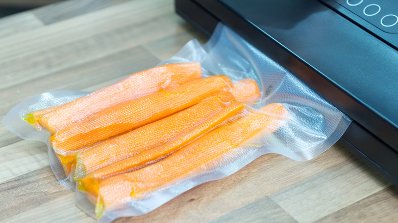 Carrots being vacuum sealed