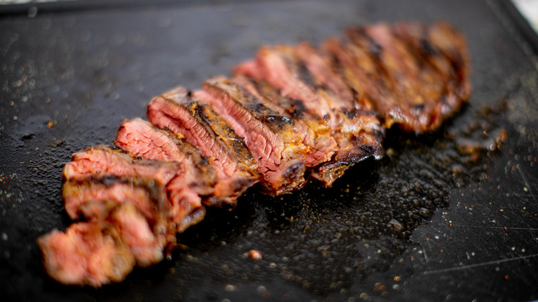 Sliced cooked flank steak