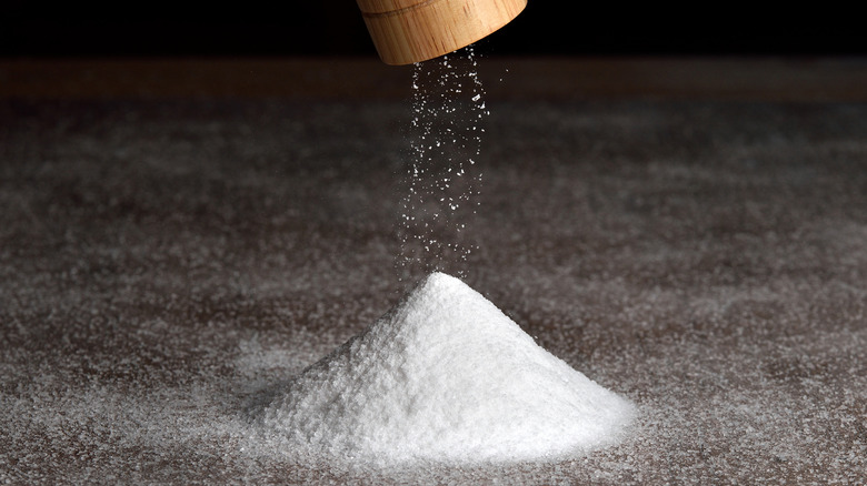 salt being poured from shaker