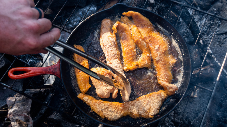 Frying fish in cast-iron skillet