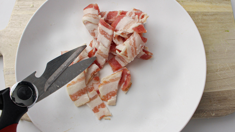 scissors cutting bacon