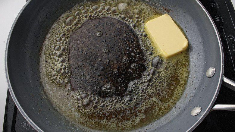 butter melting in skillet