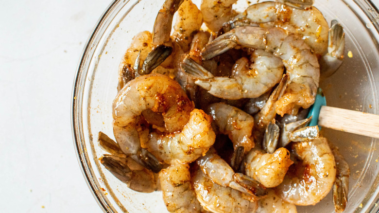 shrimp in bowl of marinade