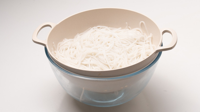 noodles draining in colander