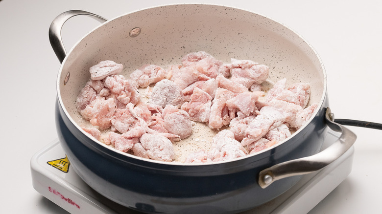 chicken in a frying pan