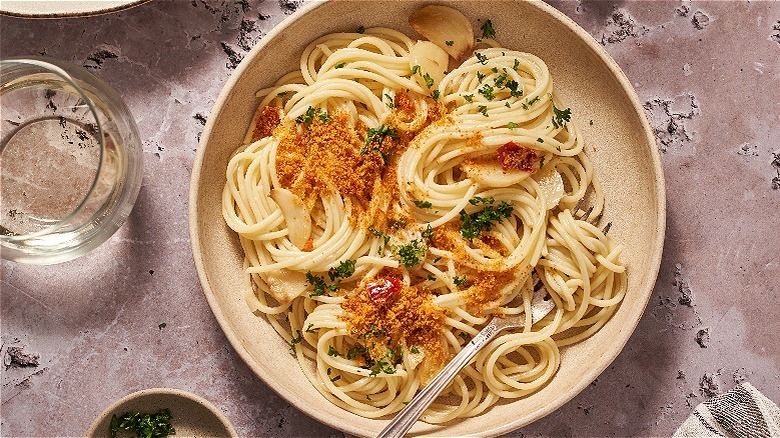 bowl of spaghetti with breadcrumbs