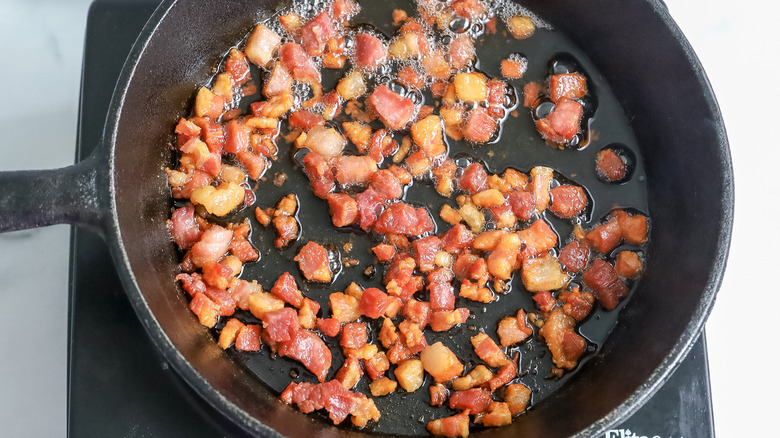 diced meat in frying pan