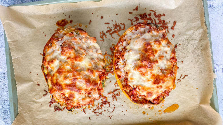 baked stuffed squash on paper