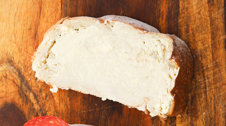 One slice of buttered country bread