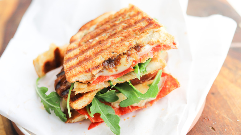 Sliced chorizo panini on plate