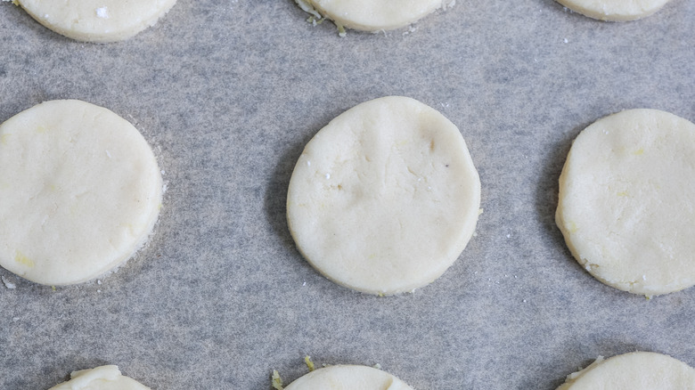 unbaked polvorones cookies on pan